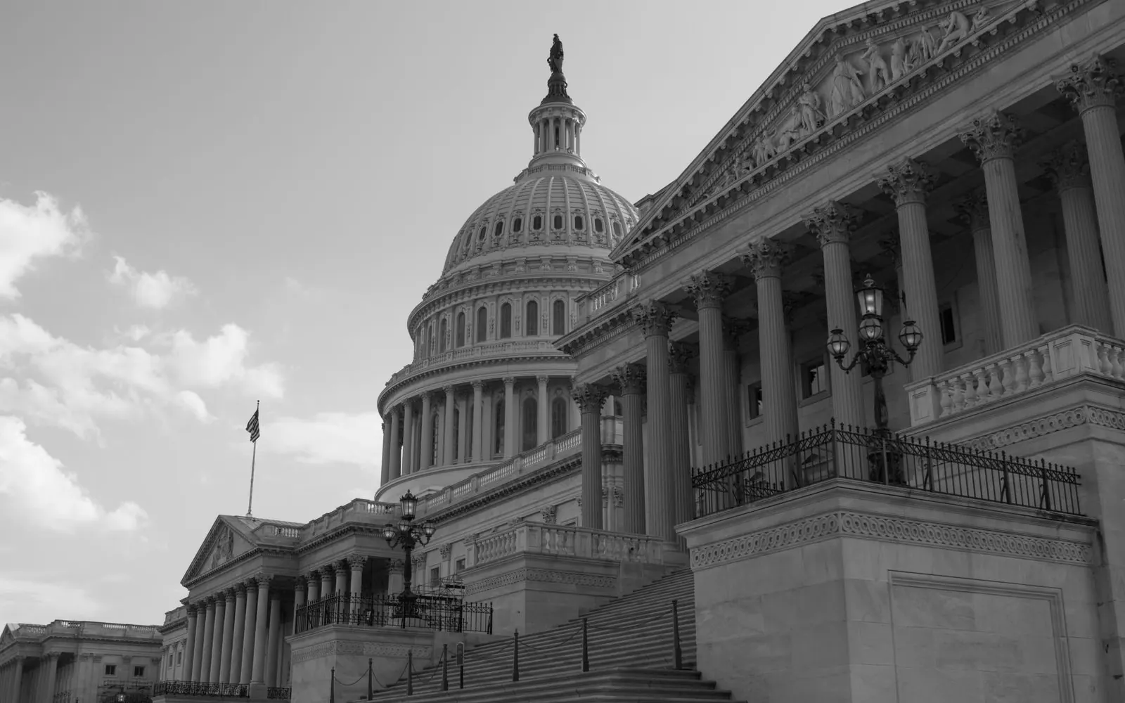 The United States Capitol in Washington, the dome and the columns, in black and white